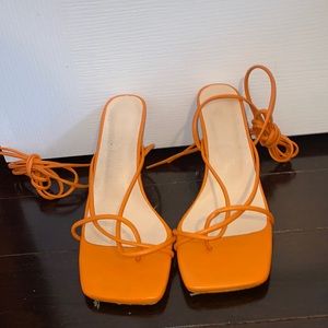 Orange heels tie up